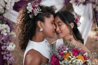 beautiful-lesbian-couple-celebrating-their-wedding-day-outdoors