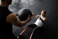 close-up-people-training-with-ball