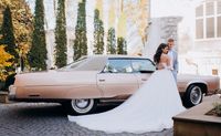 side-view-beautiful-newlyweds-stand-background-pink-car-sunny-day